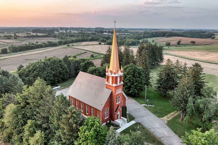 Church Among Fields At Sunrise