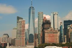 Impressive cityscape of New York City featuring the iconic One World Trade Center amidst modern skyscrapers.