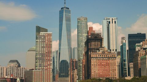Impressive cityscape of New York City featuring the iconic One World Trade Center amidst modern skyscrapers.