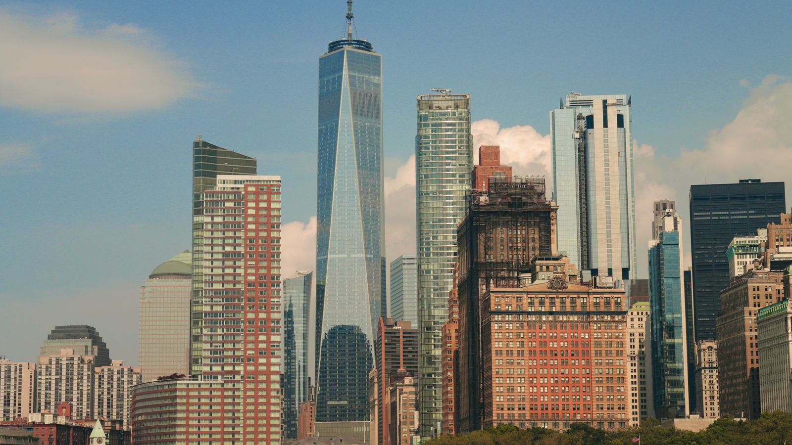 Impressive cityscape of New York City featuring the iconic One World Trade Center amidst modern skyscrapers.