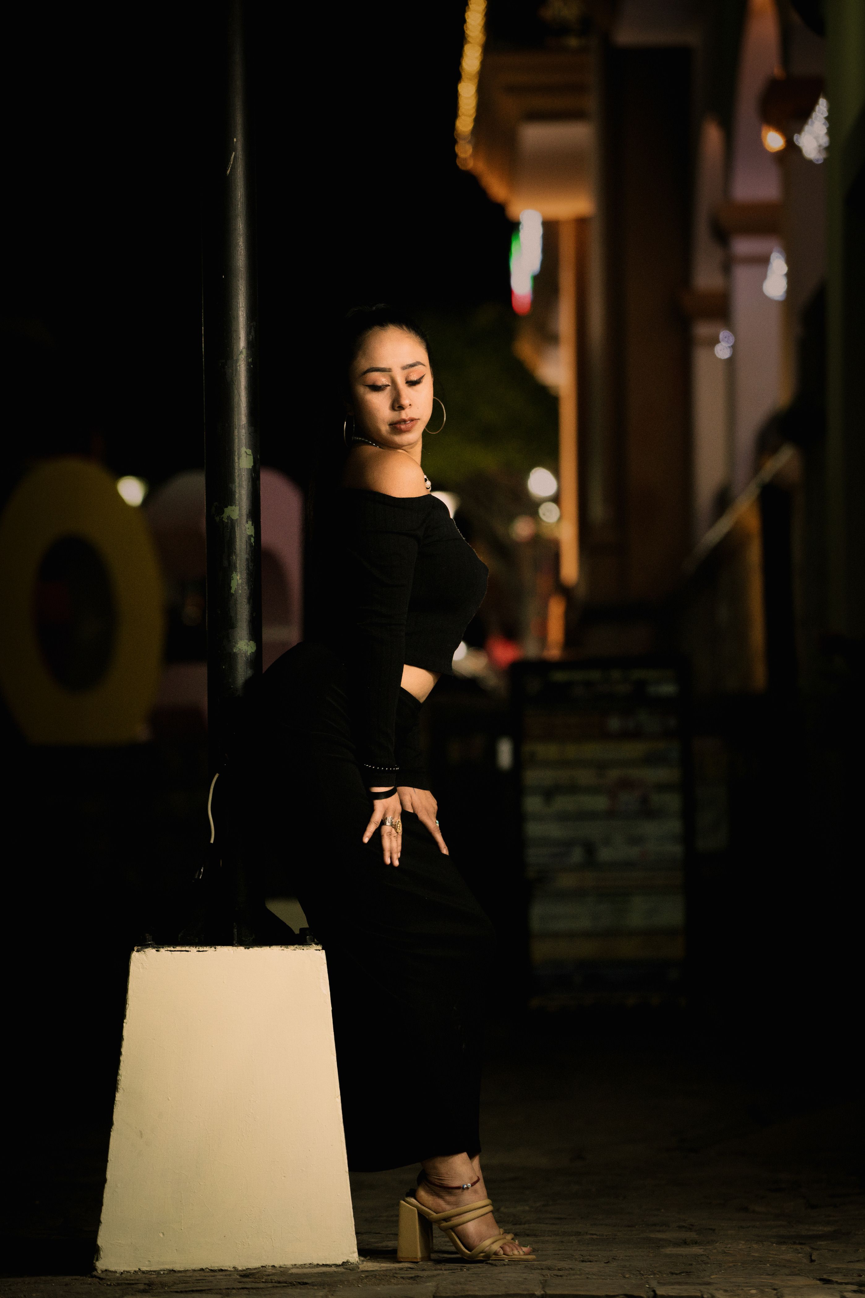 Woman Posing in Black Clothes at Night · Free Stock Photo