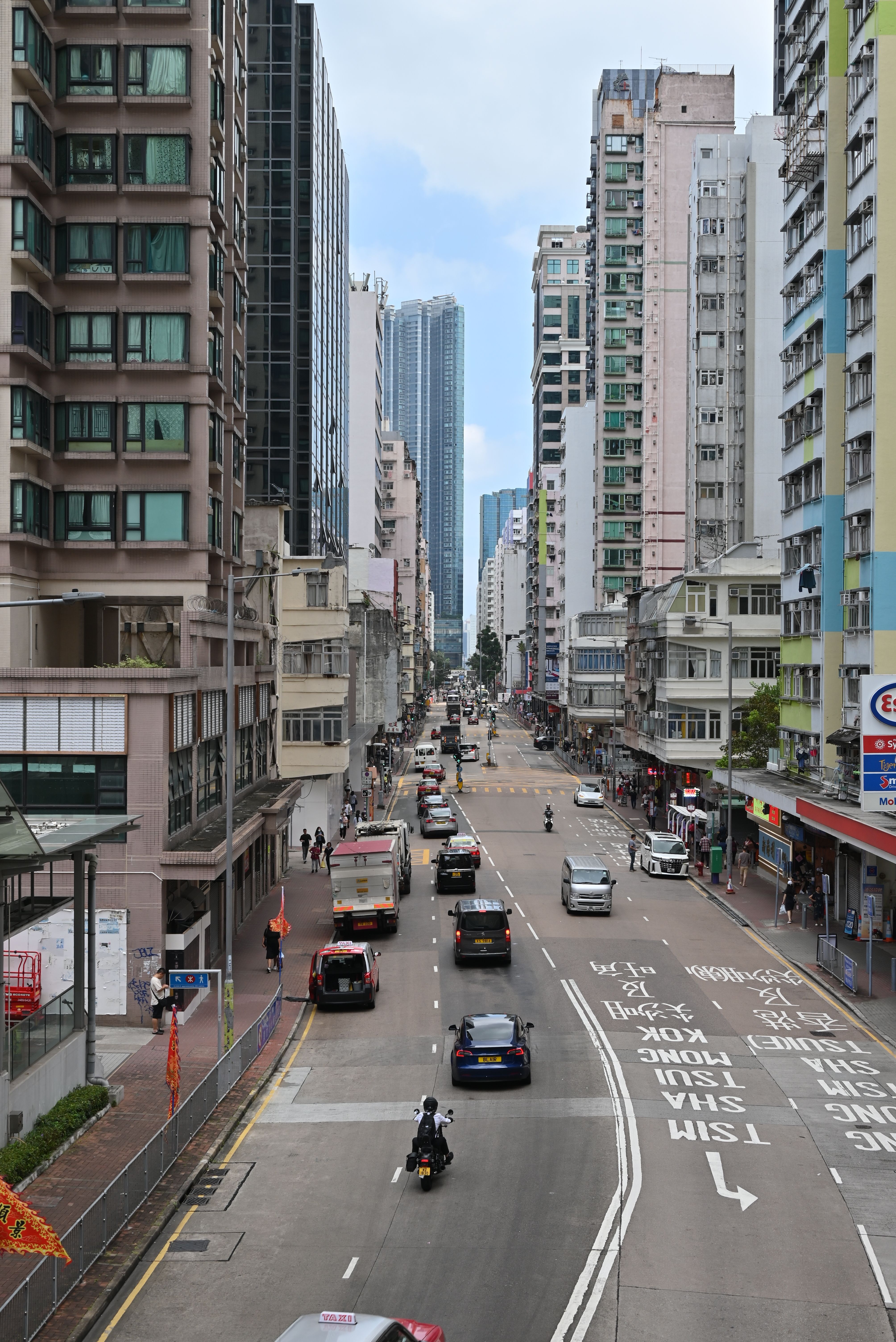 Low Traffic on City Street between High Rise Bui · Free Stock Photo