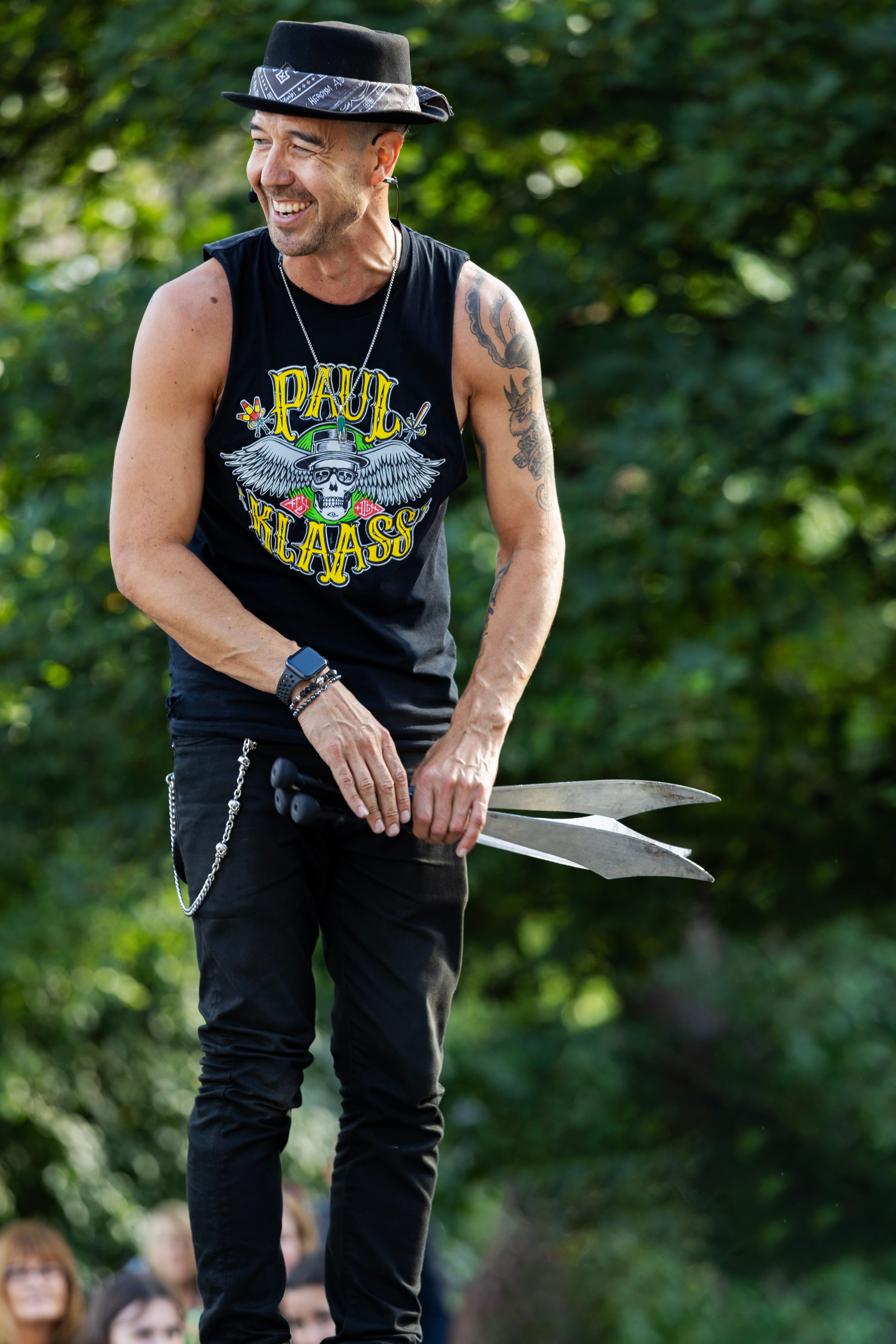 Smiling Man with Knives · Free Stock Photo