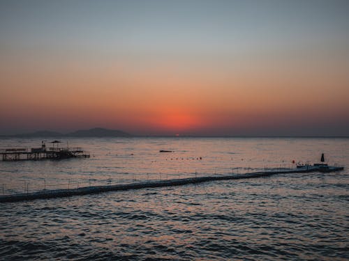 Безкоштовне стокове фото на тему «буї, горизонт, Захід сонця»