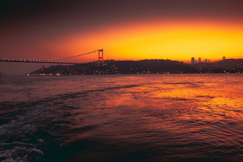 Bosphorus Strait near Fatih Sultan Mehmet Bridge in Istanbul at Sunset
