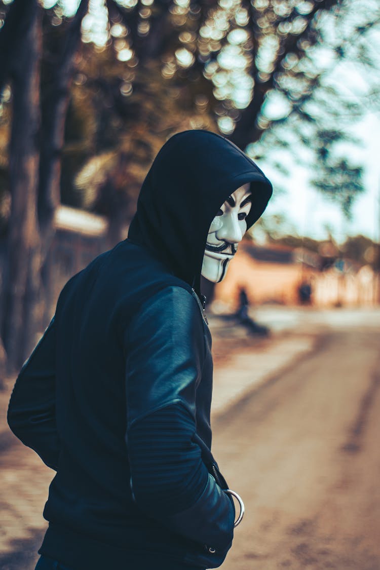 Man Wearing Hoodie And Mask