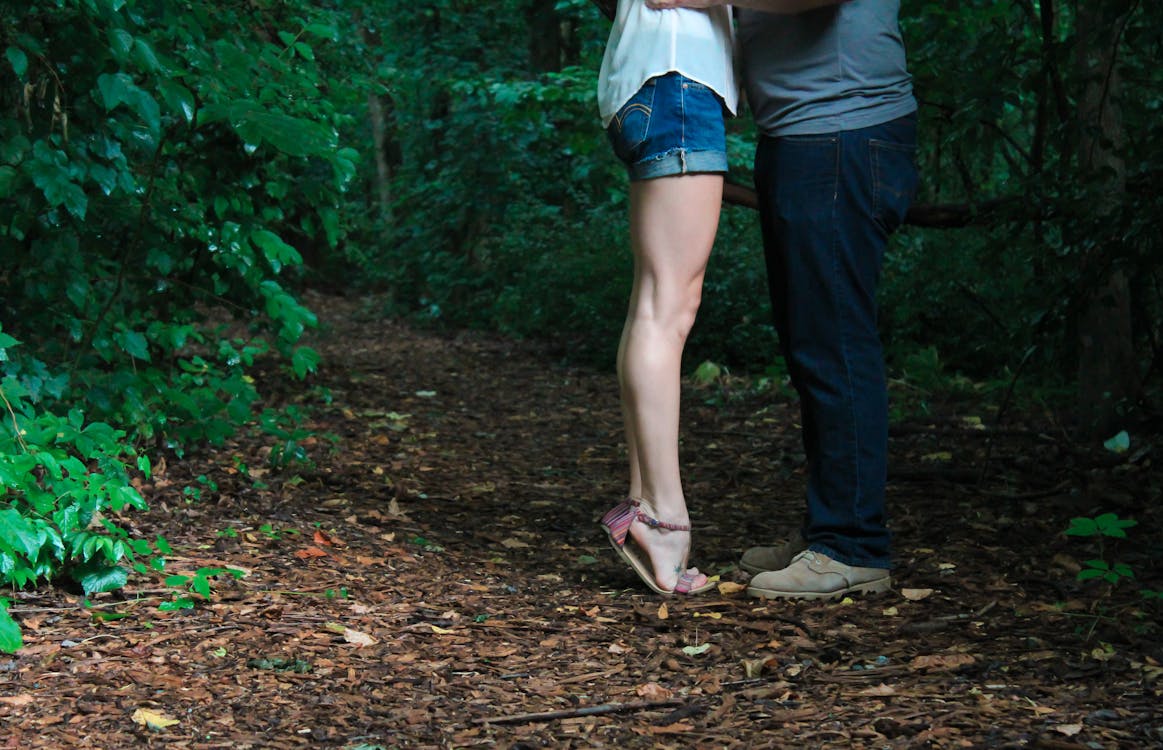 Free Man and Woman Standing Face to Face Stock Photo