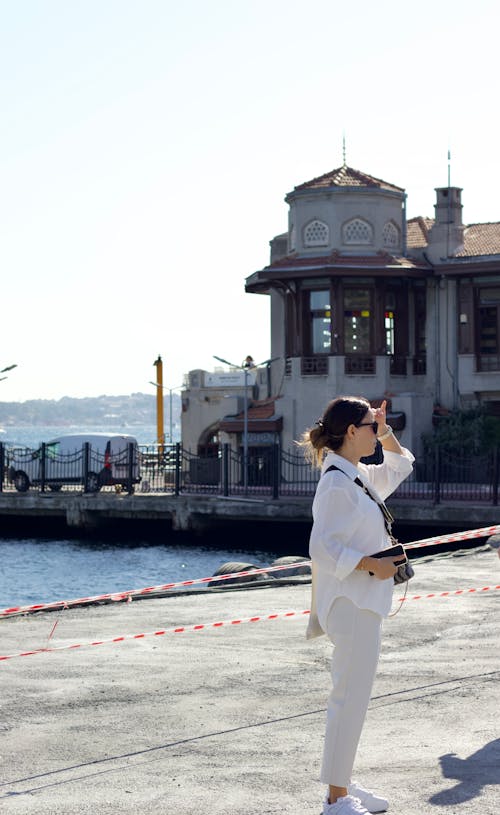 Woman Standing near a Ferry Port in Istanbul, Turkey