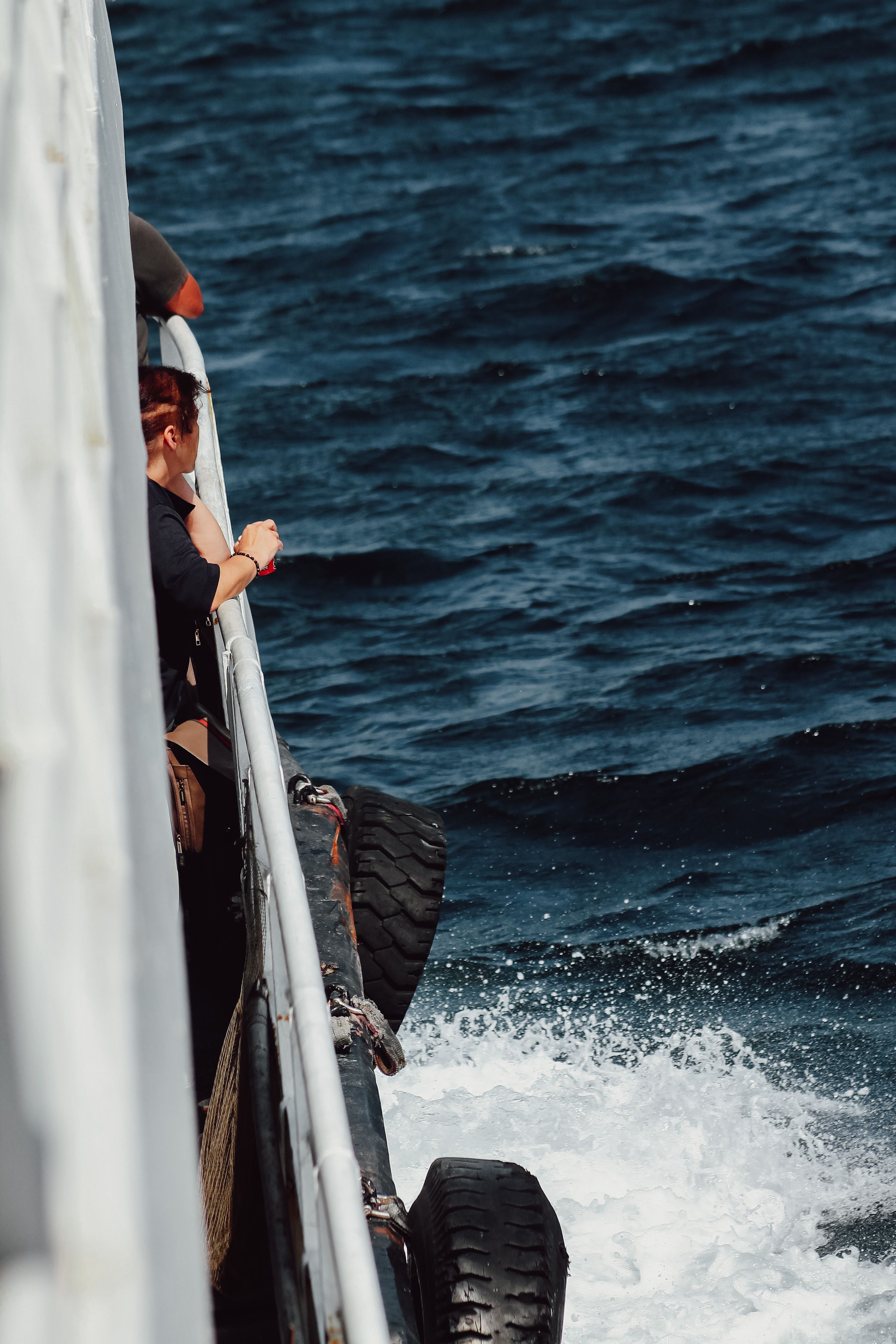 People Standing on a Ship Deck and Looking at Sea · Free Stock Photo