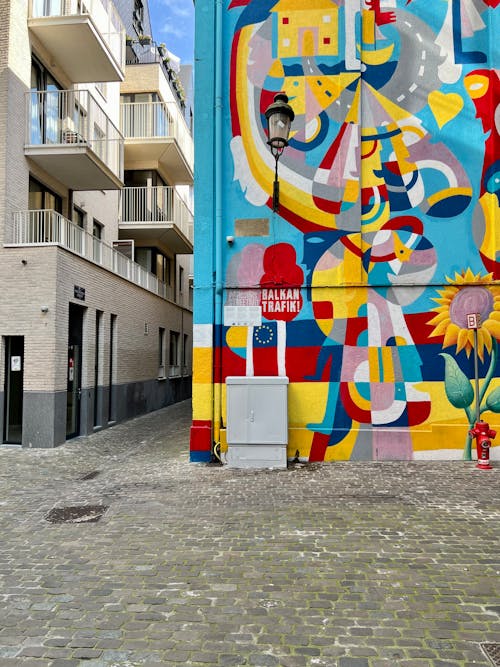 A Colorful Mural on the Wall of a Building in City