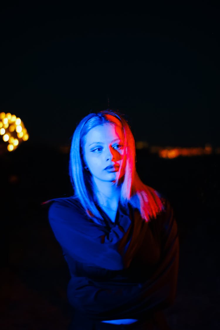 Portrait Of Woman In Blue And Red Light