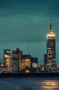 Stunning evening view of Torre Latinoamericana amongst the city lights of Ciudad de México.