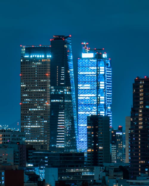 Blue Cityscape with Illuminated Modern Buildings