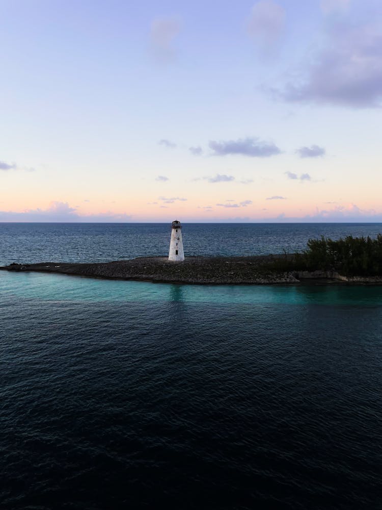 Lighthouse At Dawn