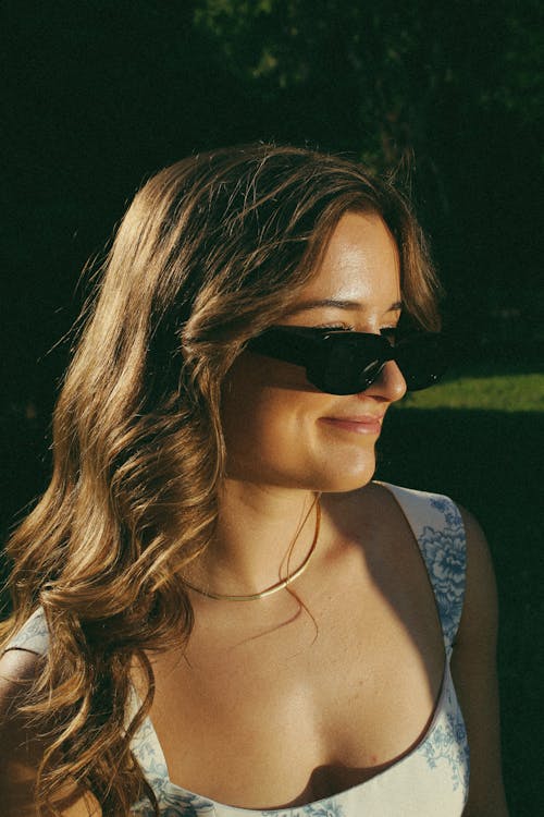 Portrait of Blonde Woman Wearing Sunglasses
