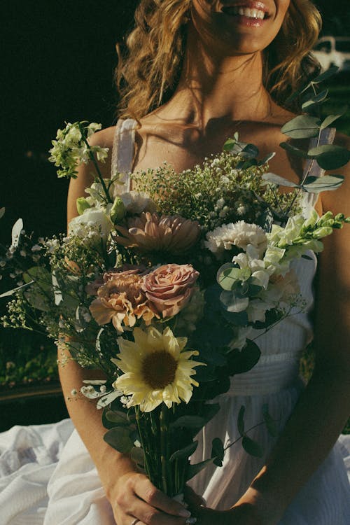 Smiling Bride Holding Bouquet