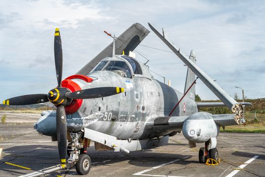 A Breguet Br-1050 Alize military aircraft displayed on an outdoor tarmac.