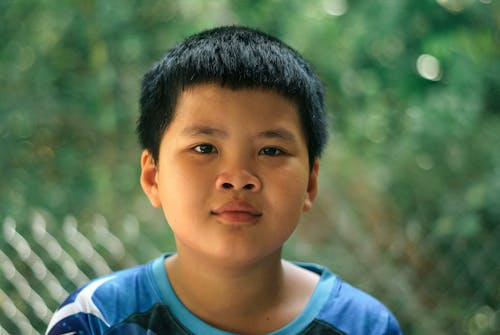 Free Portrait of Boy with Black Hair Stock Photo