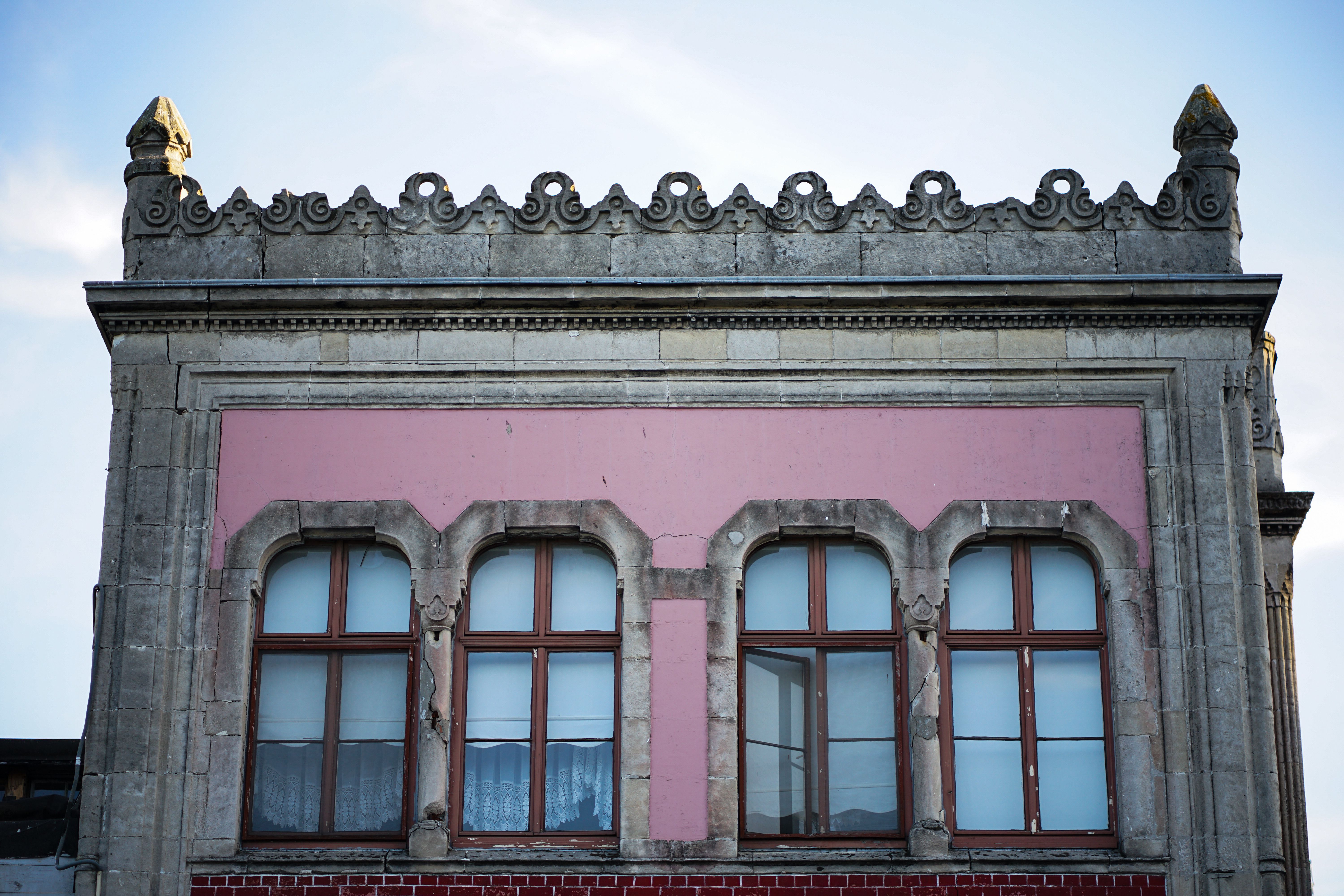 Decorated Wall of Pink Building · Free Stock Photo