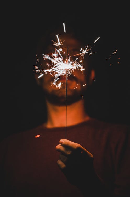 Man Holding a Sparkler