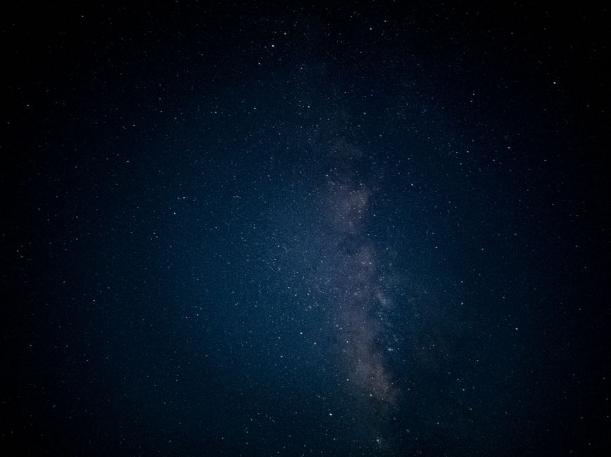 A breathtaking view of the Milky Way galaxy surrounded by a star-filled night sky.