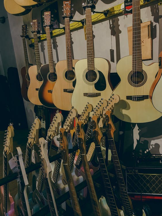 Collection of electric and acoustic guitars