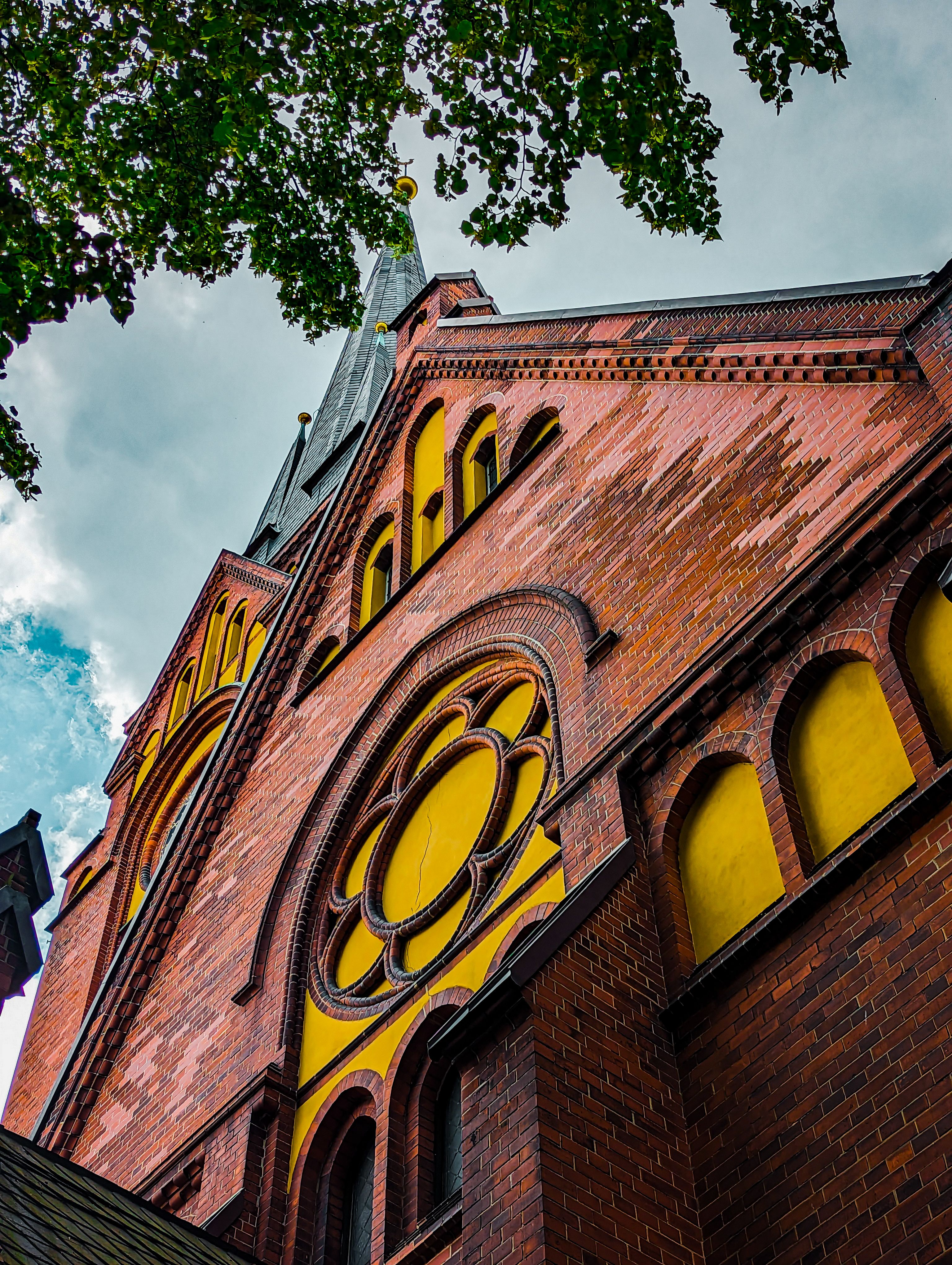 Low Angle Shot of a Gothic Church · Free Stock Photo