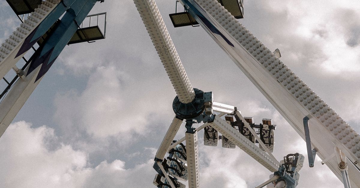 Fair Ride Inversion Fairground Ride in Motion · Free Stock Photo