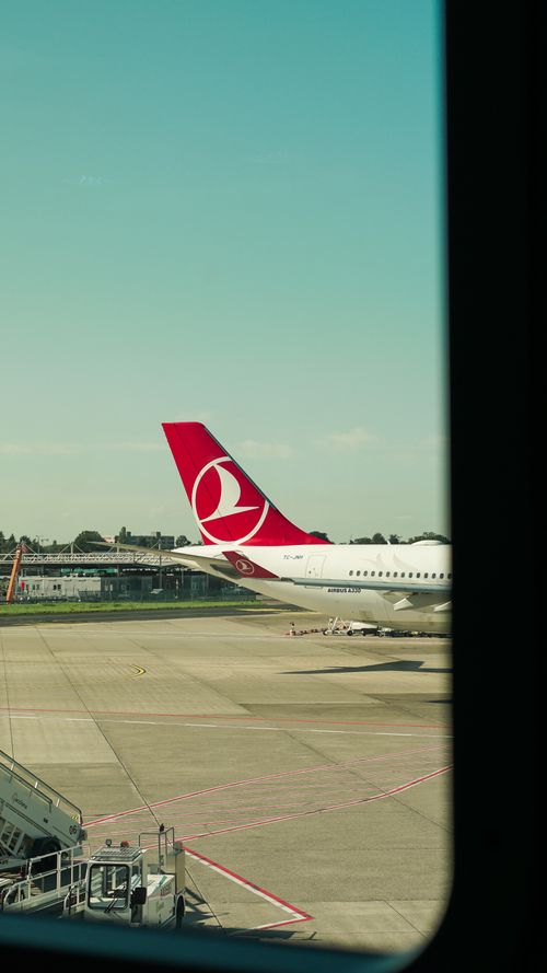 Free A commercial airplane on the runway at Düsseldorf Airport, Germany. Stock Photo