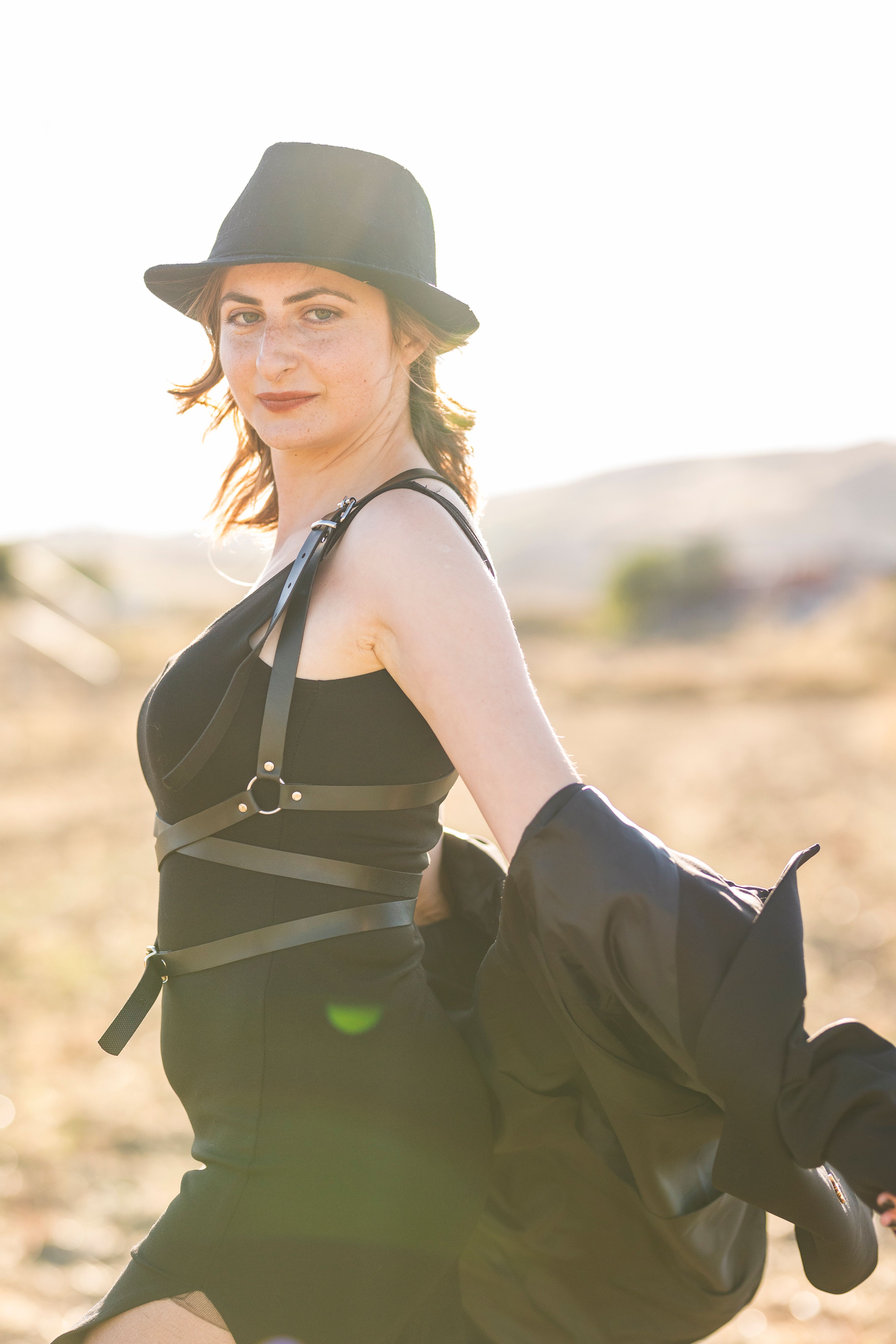 Woman in Mesh Hat and Leather Jacket · Free Stock Photo