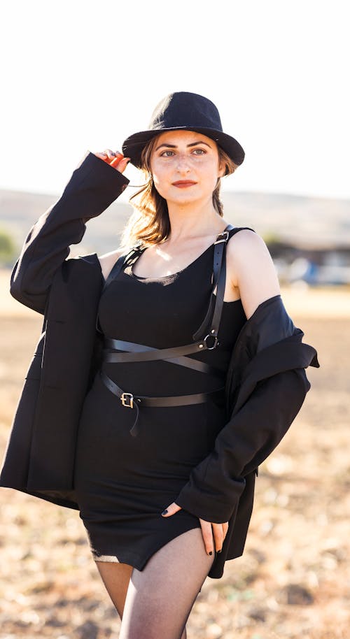 Model in Black Dress and Hat