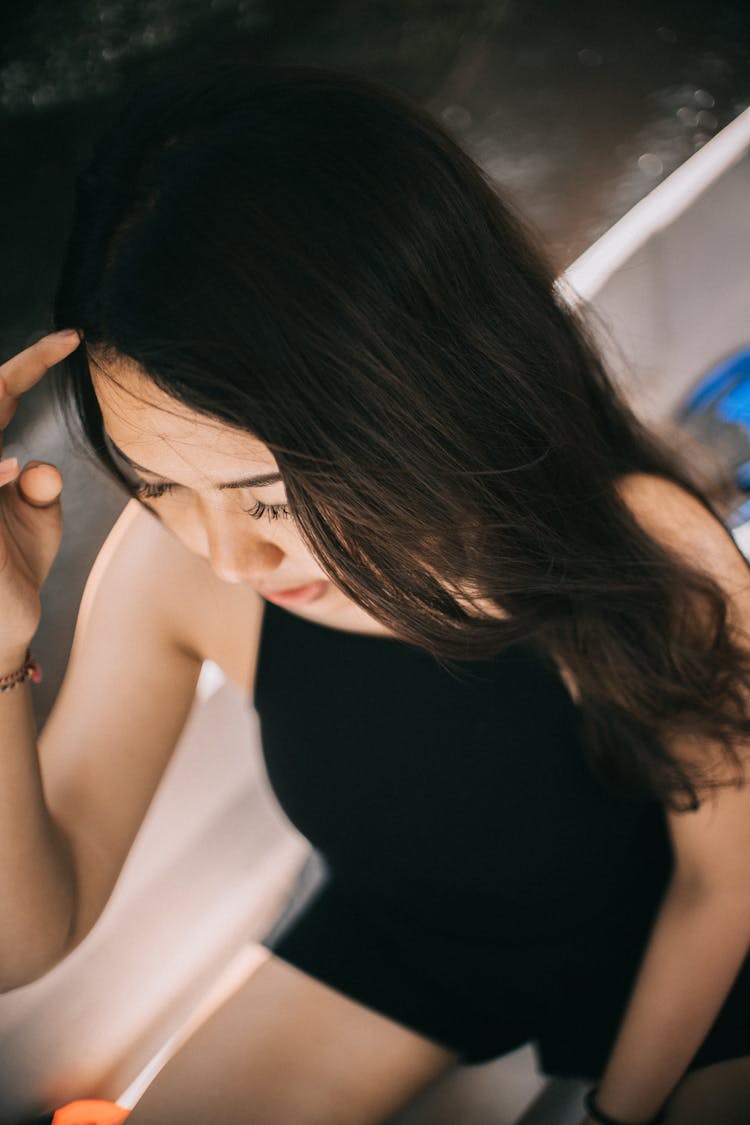 Woman Wearing Black Camisole