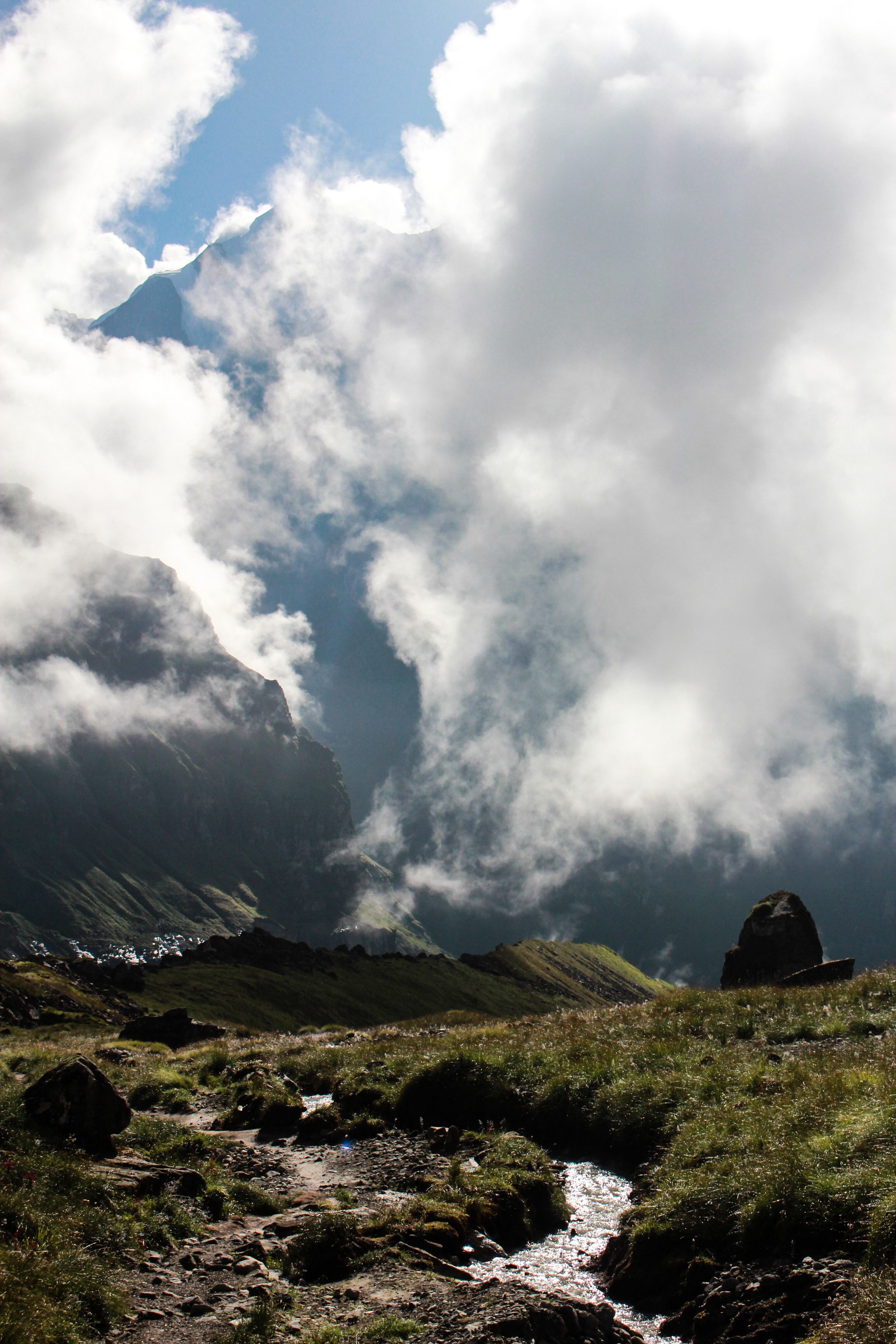 Clouds Hanging Low over a Mountain Valley Landscape · Free Stock Photo