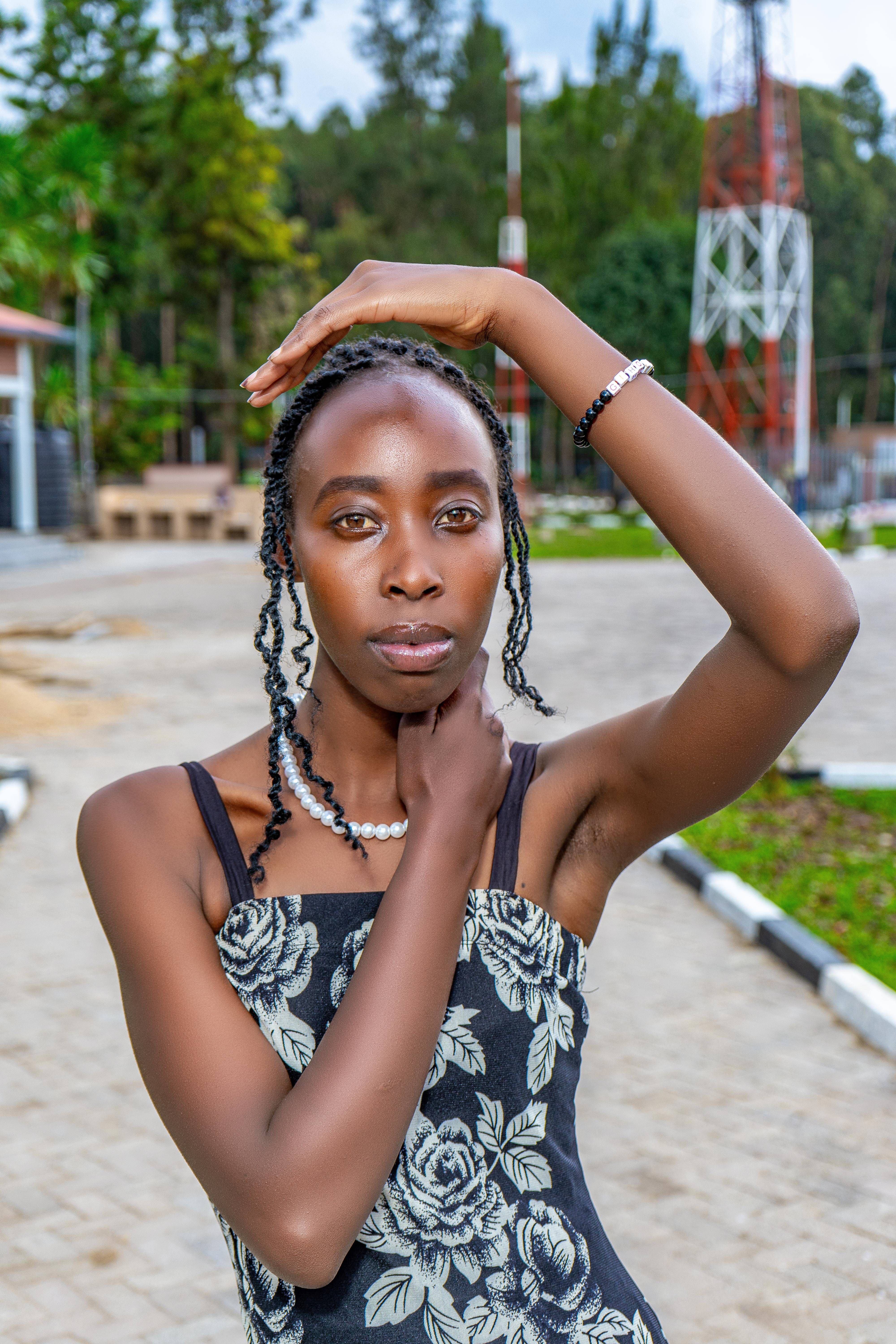 Woman Posing with Hand above her Head · Free Stock Photo