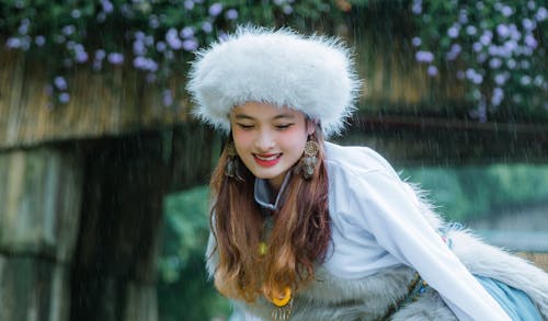 Smiling Model in Fluffy Fur Hat