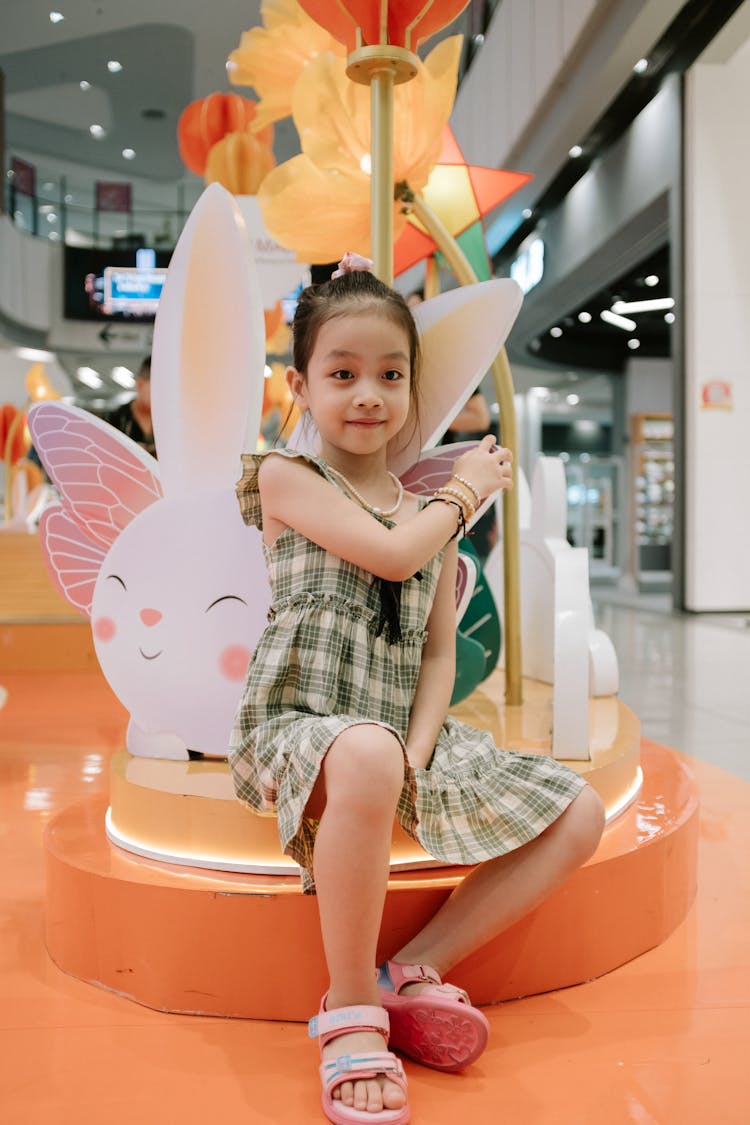 Little Asian Girl In A Shopping Mall