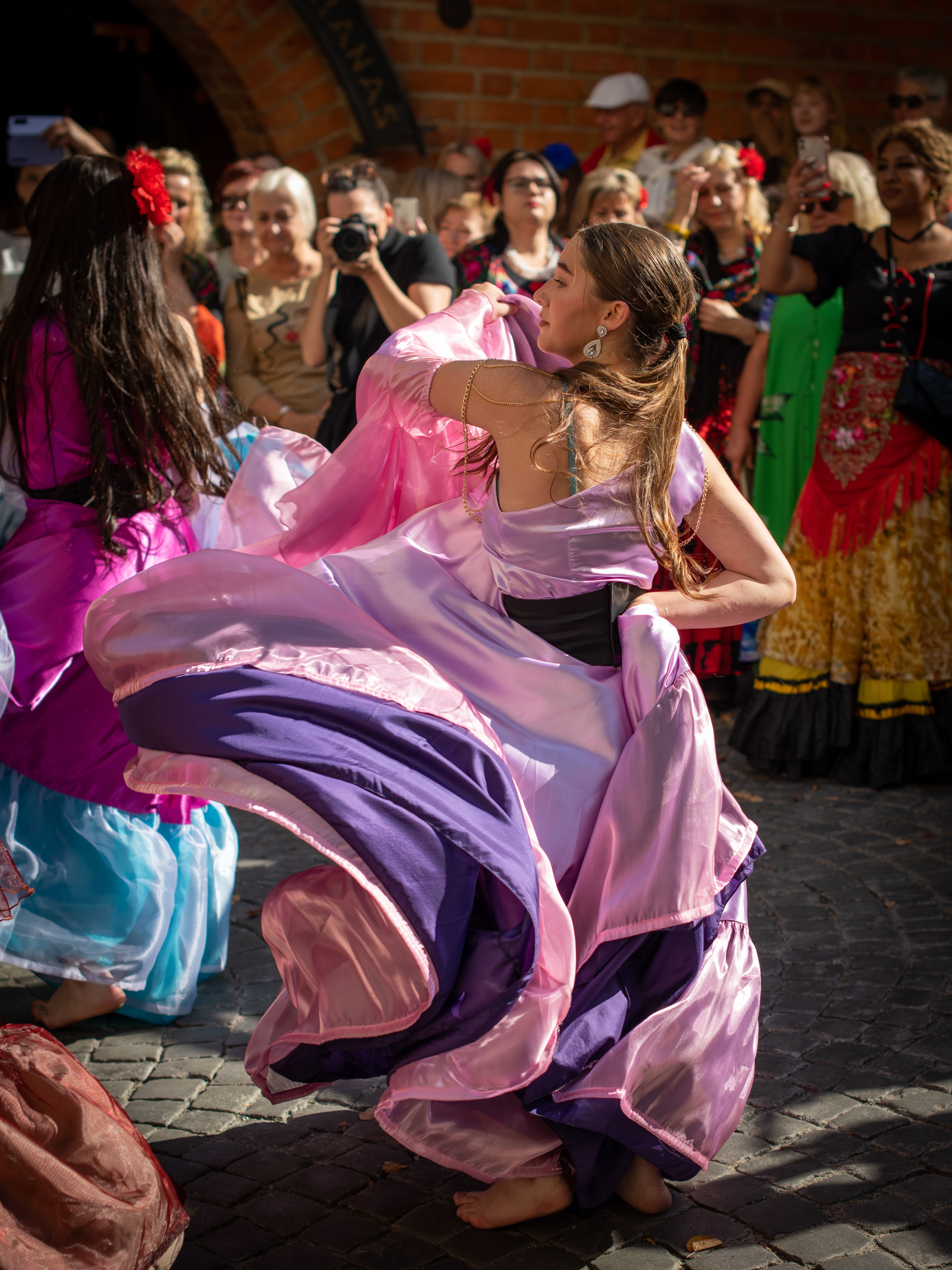 Woman in Purple Dress Dancing in Festival  Free Stock Photo