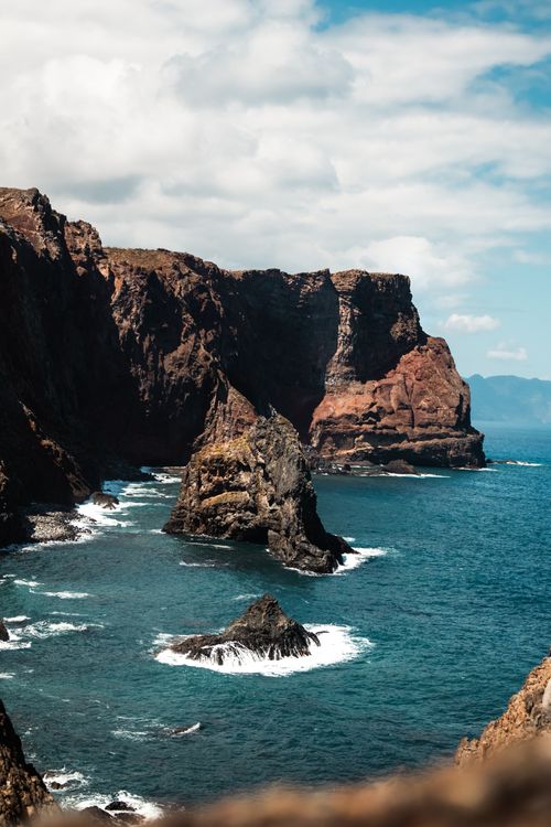 Free Explore the stunning rocky coastline and cliffs of Madeira, Portugal. Stock Photo