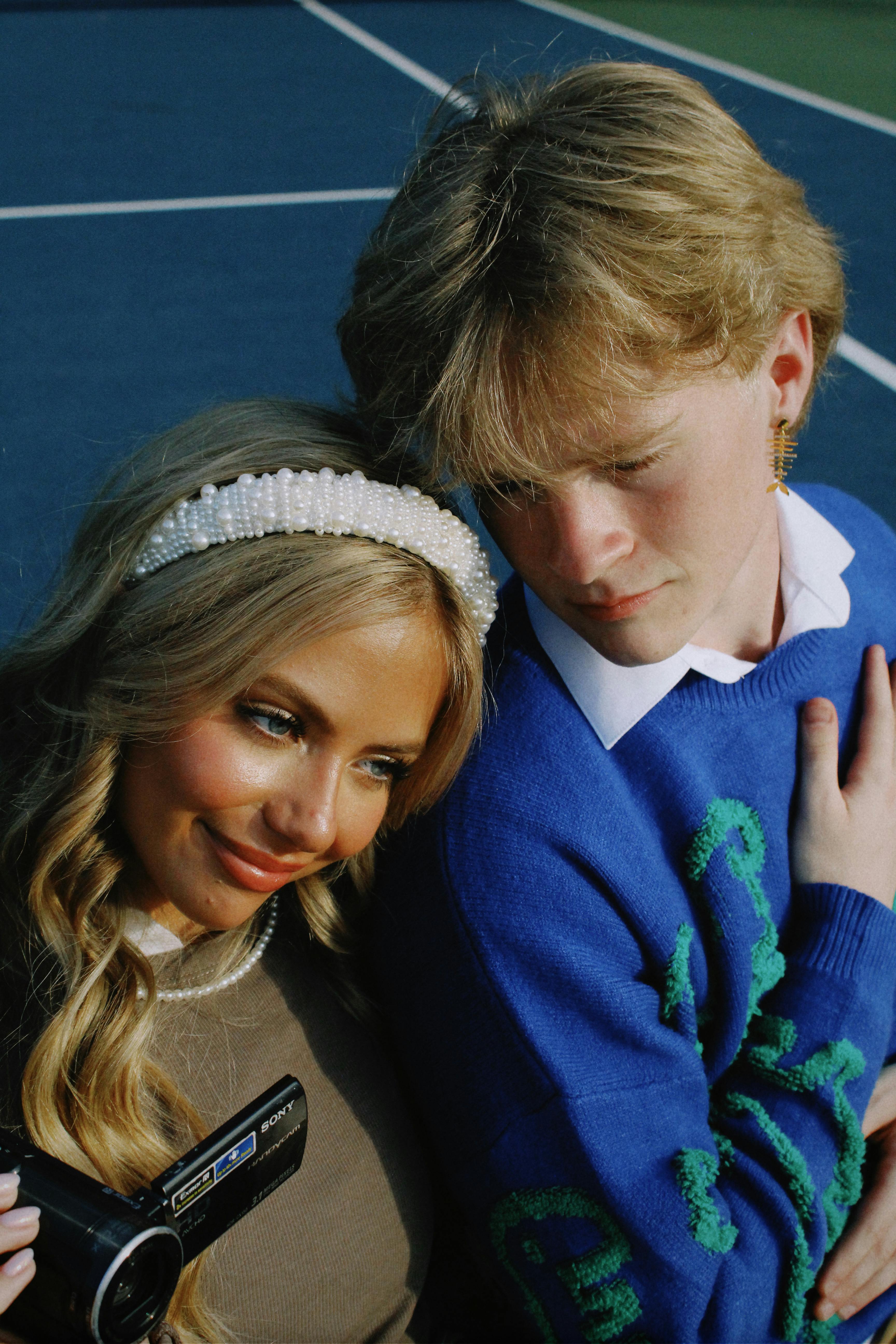 Smiling Blonde Couple Together · Free Stock Photo