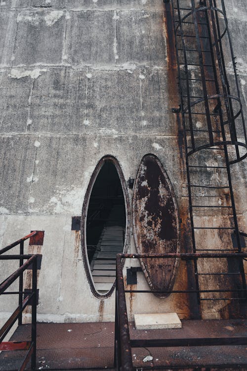 Open Rusty Hatch of Abandoned Cooling Tower