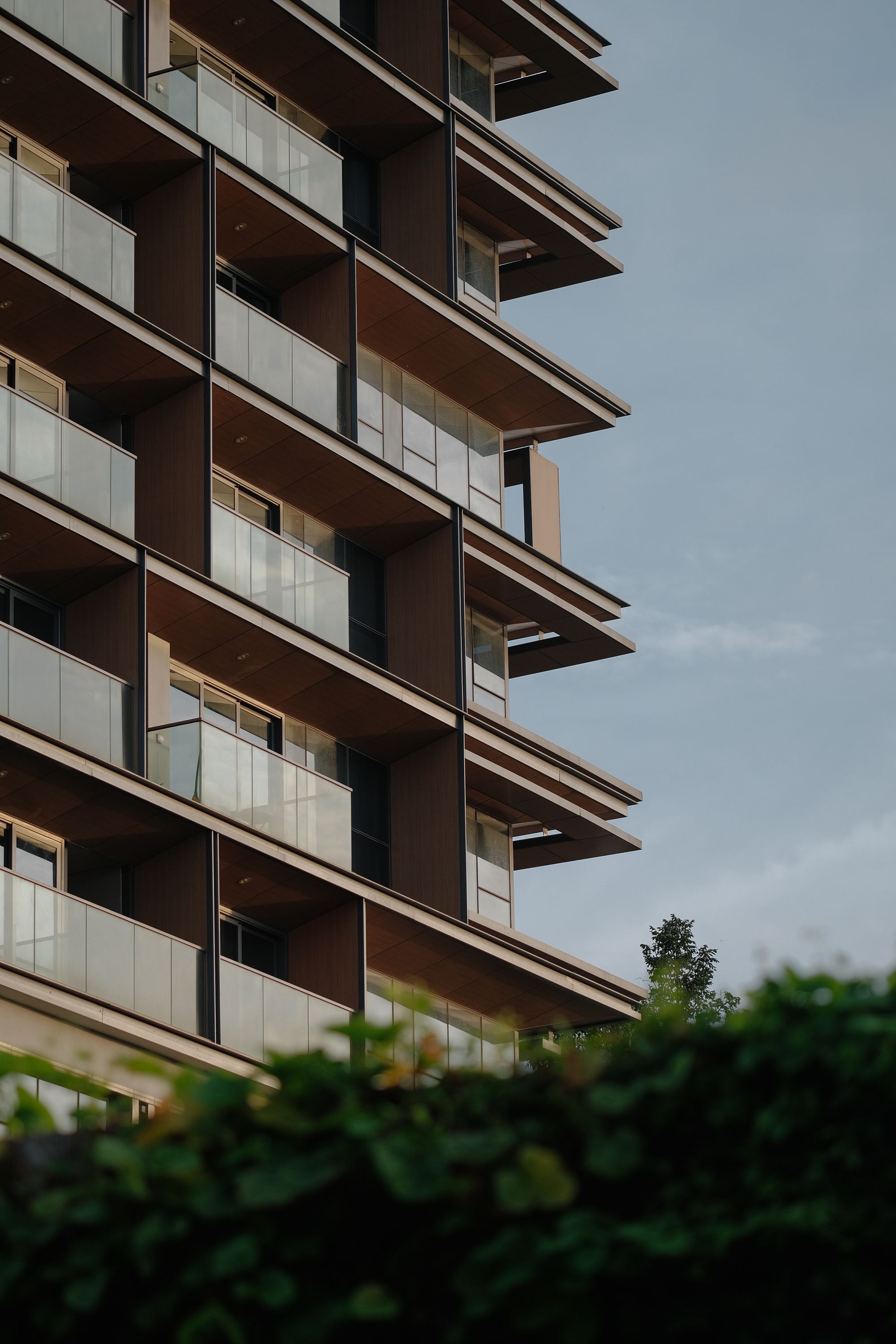 Image showcasing Modern High-Rise Apartment Building · Free Stock Photo
