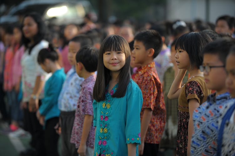 Children Standing Together In Row