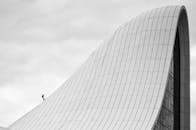 A Person Walking on the Roof of the Heydar Aliyev Centre, Baku, Azerbaijan