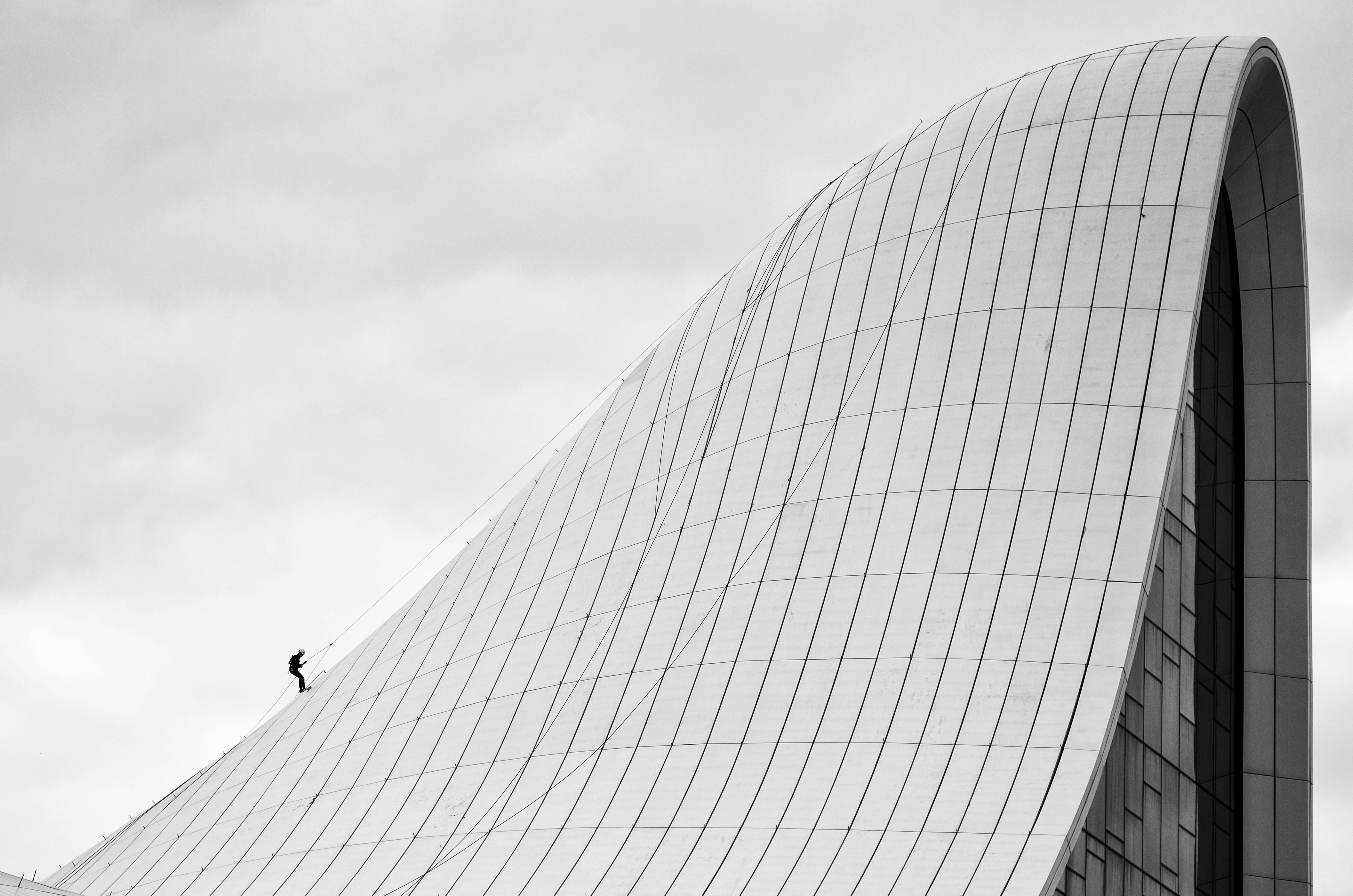 A Person Walking on the Roof of the Heydar Aliyev Centre, Baku, Azerbaijan