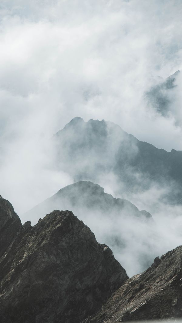 Layered mountain range in haze — Dajana Reçi on Pexels