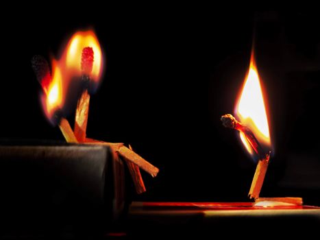 Glowing Flames in Dark Room.