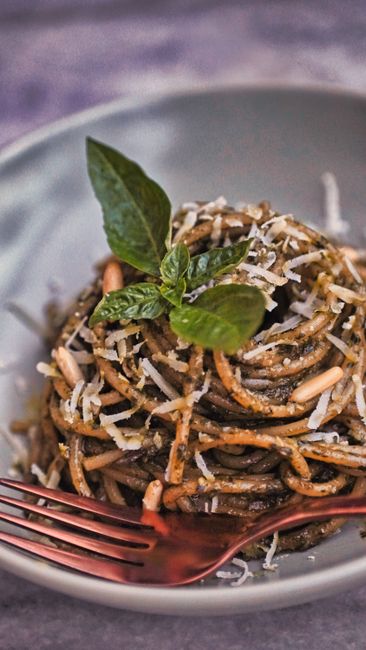 basil pesto with pine nuts in a bowl