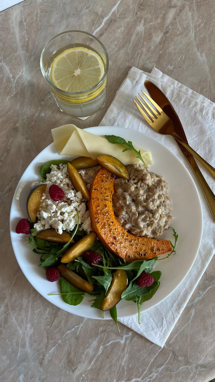 A Delicious Meal With Fruit And Vegetables 