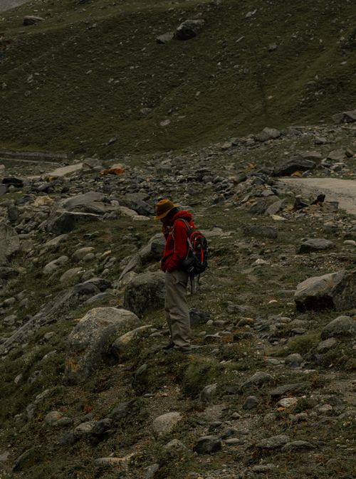 Free A solitary backpacker explores rugged mountainous terrain in Himachal Pradesh, India. Stock Photo