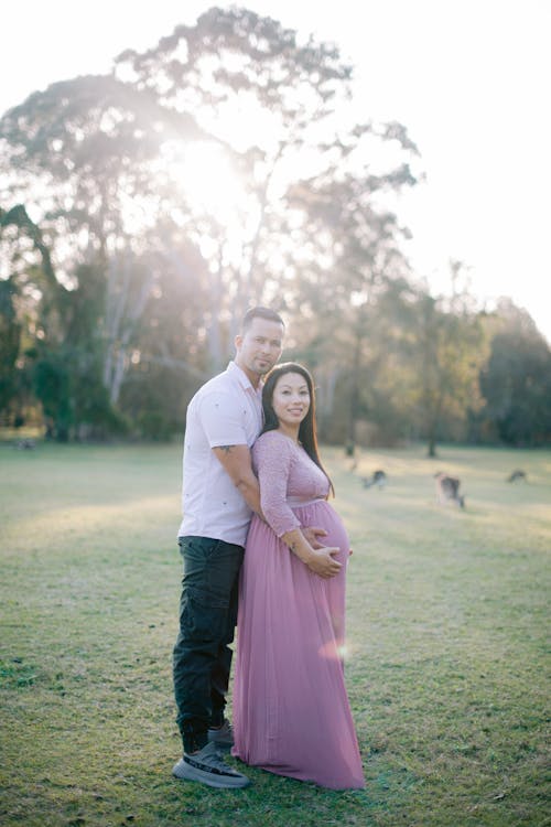 Man with Pregnant Woman in Park